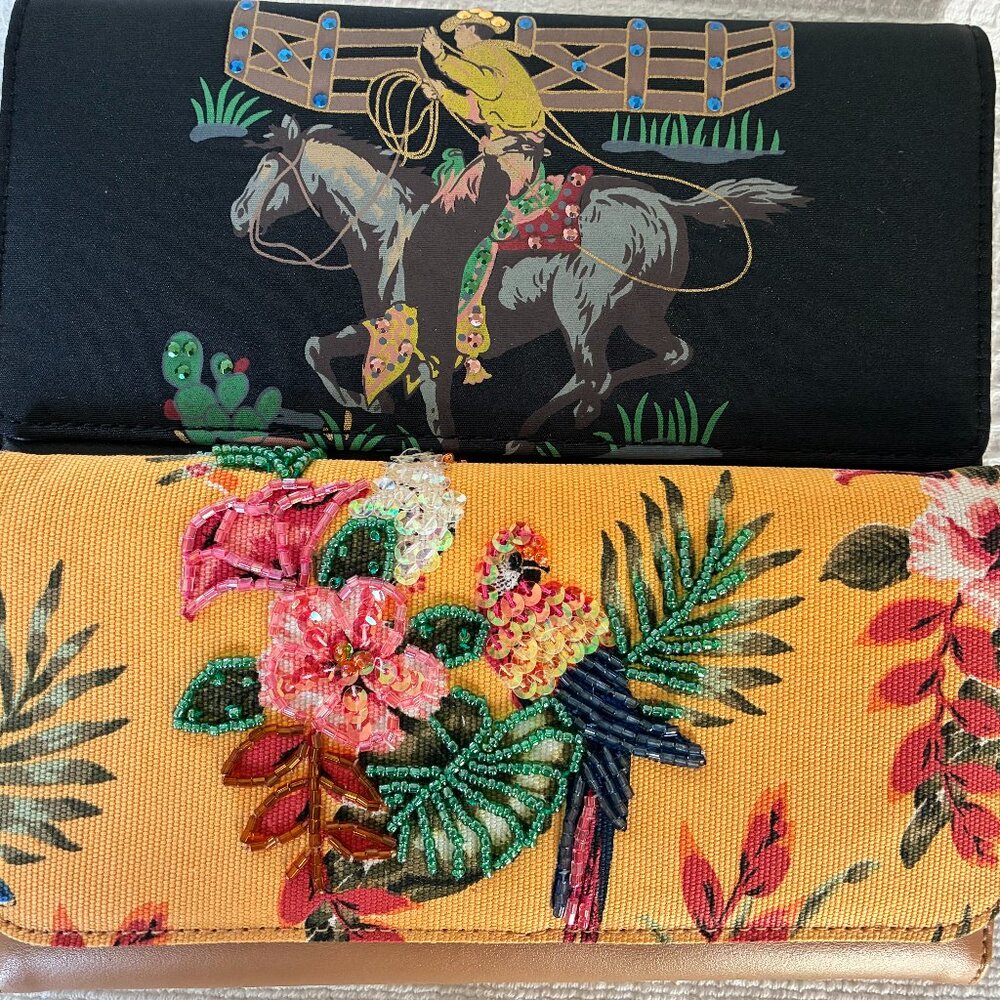 Set of wallets, cowboy and parrot. New